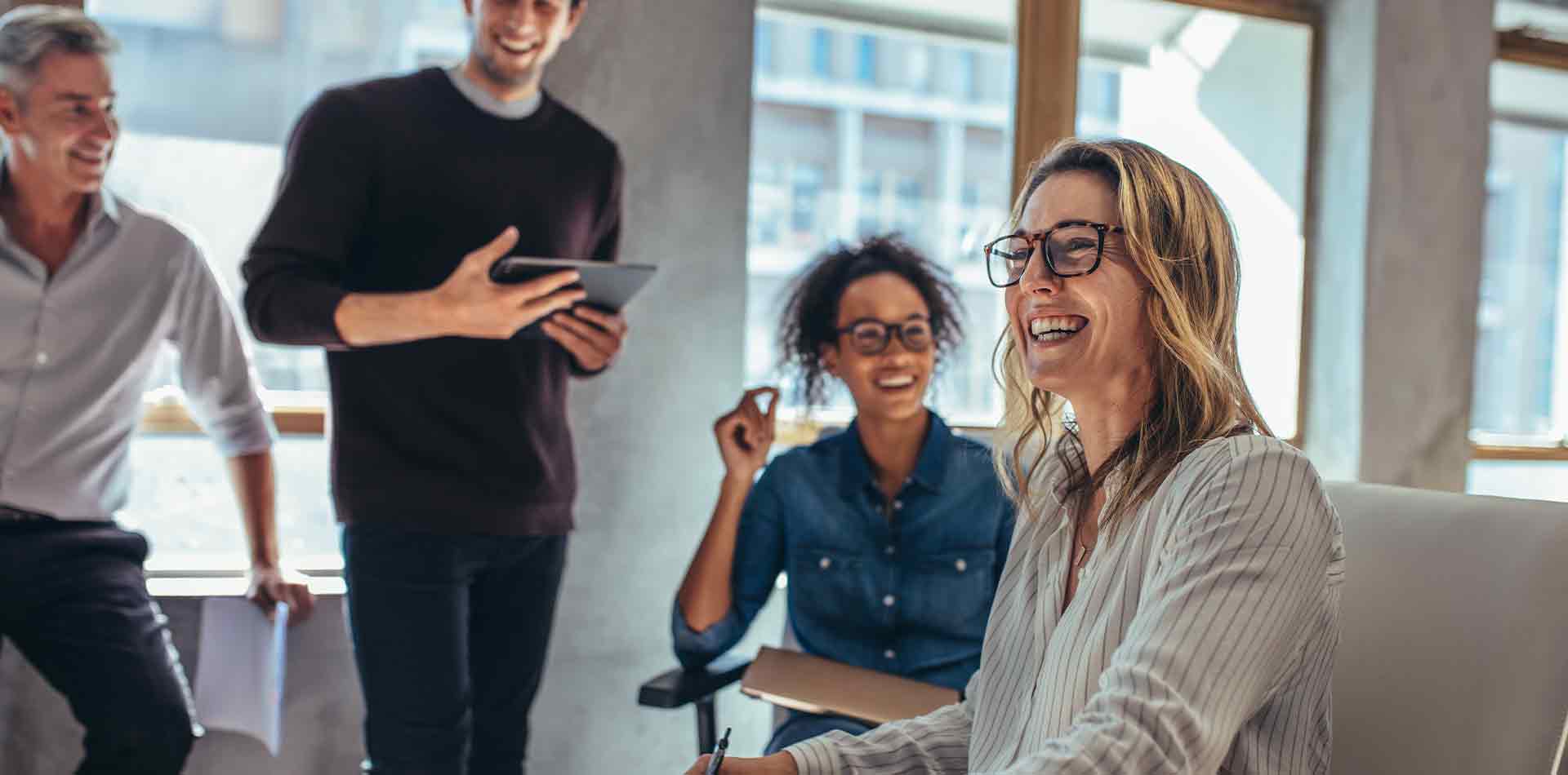 Business owner with her group of employees.
